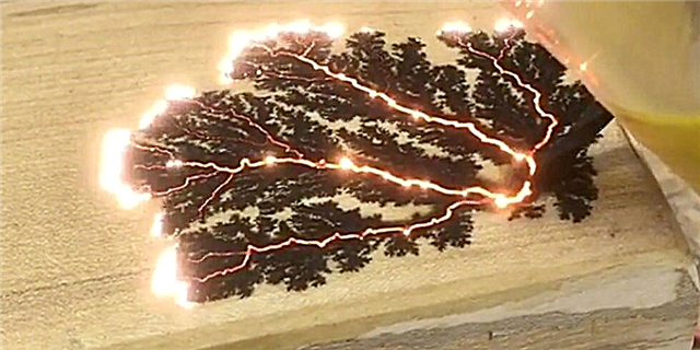 Канадын мод үйлдвэрлэгч модонд гоёмсог хээг шатаахын тулд цахилгаан ашигладаг